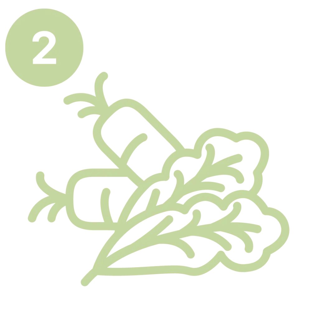 An animated image of carrots and kale.